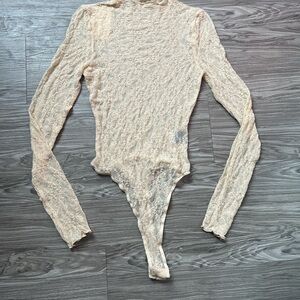 Chic Lace Long Sleeve Bodysuit in Cream